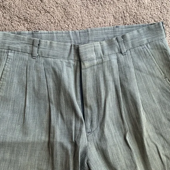 Men’s grey dress pants with pockets and a black zipper. Size small - Picture 2 of 7